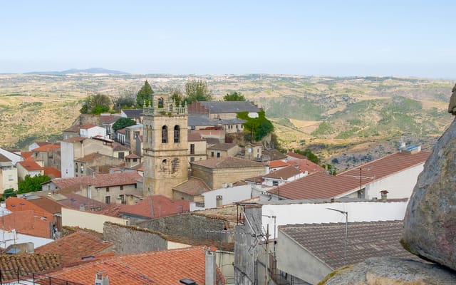 Fermoselle, on the Spanish bank: the village holds the ridge, and its cellars are cut into the rock beneath the houses.